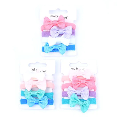 Elastics / Card of 4 soft jersey elastics with bow motif